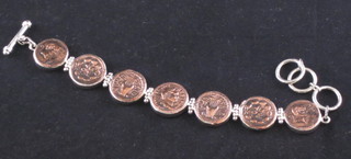 A silver coin bracelet