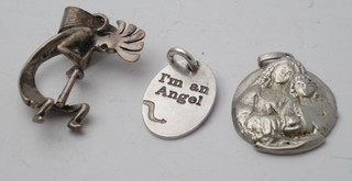 3 various silver pendants