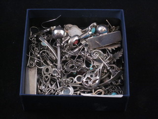 A quantity of various silver earrings
