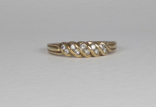 A 9ct gold half eternity ring set diamonds, approx 1/2 carat