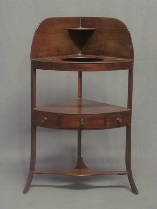 A Georgian mahogany corner wash stand with 3 bowl recepticals,  the undertier fitted a drawer 22"