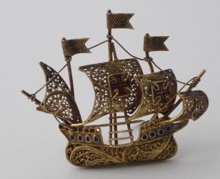A pierced gilt filigree brooch in the form of a 3 masted galleon