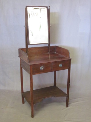 An Edwardian mahogany dressing table with mirror  and three-quarter gallery, fitted 2 short drawers and the base with  undertier 23"