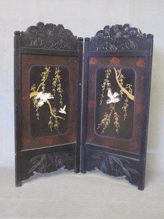 A 19th Century ebonised and lacquered 2 fold screen decorated  birds 14"