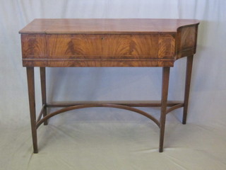 A 19th Century inlaid mahogany shaped harpsichord case/dressing table, with hinged lid, raised on square tapering  supports 48"