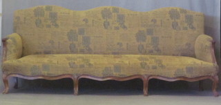 A mahogany show frame sofa upholstered in tapestry material, raised on cabriole supports 80"