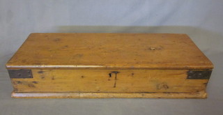 A 19th Century rectangular shallow stripped and polished pine  box with hinged lid and iron drop handles 30"