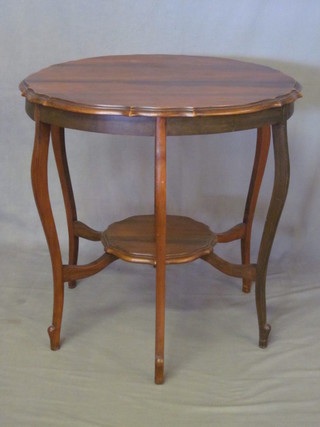 A circular Edwardian 2 tier occasional table, raised on cabriole supports 29"