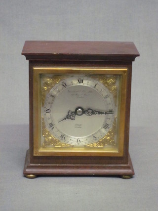 An Elliott 8 day bracket clock with square silvered dial by Garrard & Co, contained in a square walnut case, 5"   ILLUSTRATED