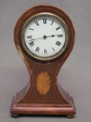 A French timepiece with enamelled dial and Roman numerals  contained in an inlaid mahogany balloon shaped case   ILLUSTRATED
