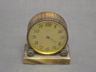 An Art Deco French timepiece with gilt dials and Arabic numerals by Zenith contained in a gilt case 3"