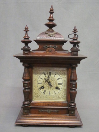 A 19th Century Continental striking bracket clock with painted  dial and Roman numerals, the dial marked Ughans, contained in  a walnut case