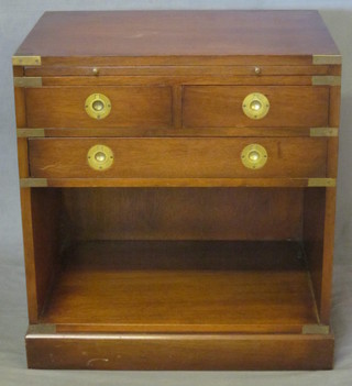 A mahogany rectangular military style bedside cabinet, fitted a brushing slide above 2 short and 1 long drawers above a recess,  22"