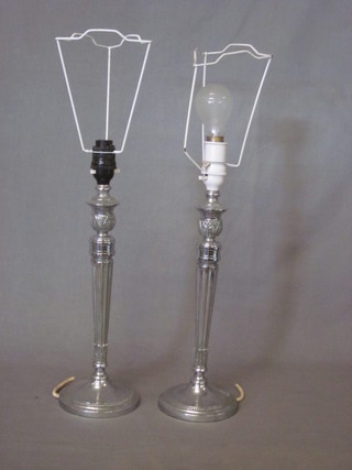 A pair of fluted chromium plated Adam style table lamps 12"