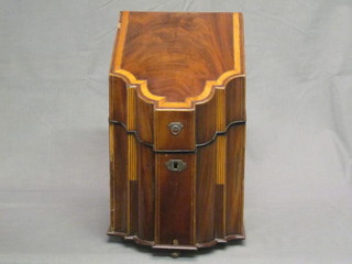 A Georgian inlaid mahogany knife box with hinged lid and of serpentine outline 9"  ILLUSTRATED