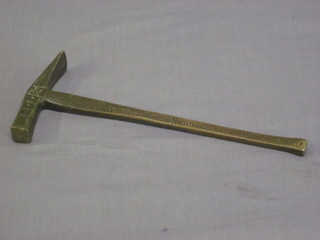 An engraved bronze hammer 8"