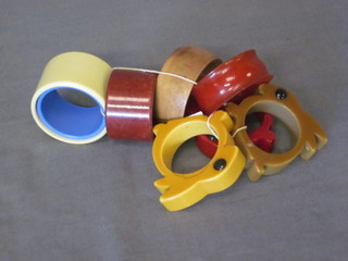 3 Art Deco plastic napkin rings in the form a rabbit and 5 other napkin rings