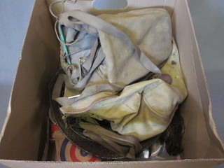 A box containing fishing tackle, lead weight moulds etc