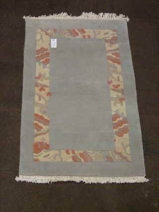 A blue ground Tibetan rug 59" x 37"