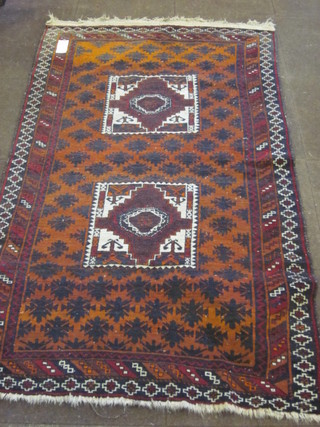 A brown ground Afghan rug 76" x 43"