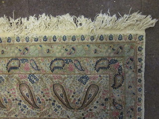 A fine quality white ground Persian carpet with all over paisley design 145" x 113"