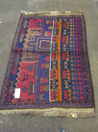 A contemporary blue ground Persian Belouche rug decorated a  city scape 54" x 34"