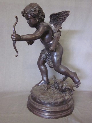 After J Daste, a bronze figure of a standing Cupid with bow,  raised on a circular base 31"  ILLUSTRATED