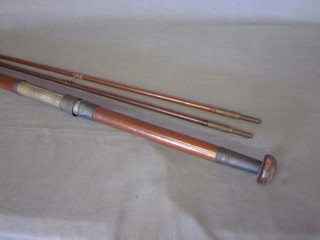 A 19th Century mahogany 3 section fishing rod with spare tip