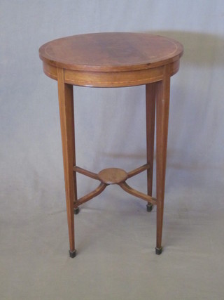 A circular Edwardian bleached inlaid mahogany occasional table, raised on square tapering supports ending in spade feet with  undertier 20"