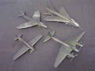 12 various pewter models of aircraft