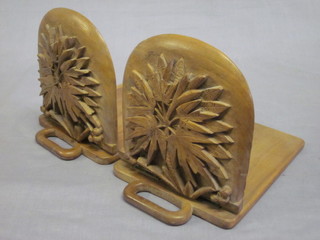 A pair of Eastern carved hardwood folding bookends