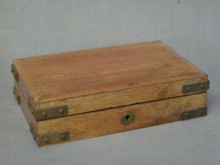 A 19th Century wooden and brass bounded shallow instrument  box with hinged lid 7"