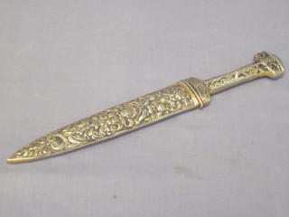 A gilt metal dagger with 6" double blade