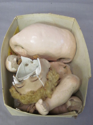 A porcelain headed doll, f, with articulated limbs