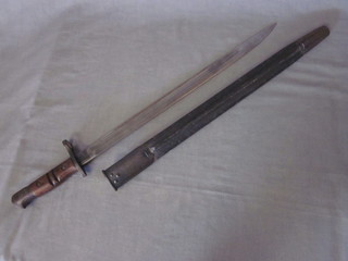 A WWI Remmington bayonet complete with scabbard