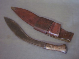 A War Office issue Kukri complete with leather scabbard and  frog, the frog marked Goco-42