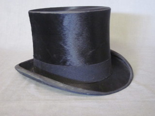 A gentleman's black silk top hat by F W Knowles