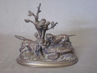 A bronze figure group of 2 retrieving dogs, the base marked E D Elabrierre, on an oval base 7"