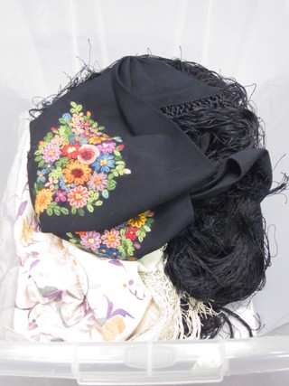 A black shawl and 1 other
