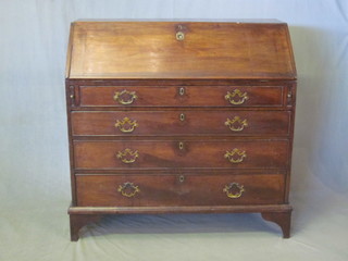 A Georgian mahogany bureau, the fall front revealing a well  fitted interior of 4 long drawers, raised on bracket feet 39"