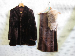 A lady's brown fur coat, 2 mink stoles and other furs