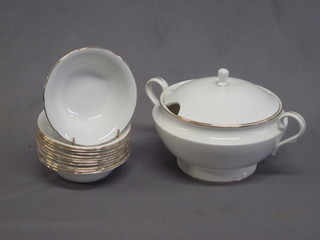 A Mayfair bone china soup service comprising circular white  glazed twin handled soup tureen and cover with gilt banding 9"  and 11 6 1/2" soup bowls
