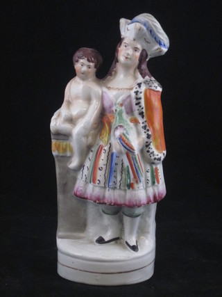 A Staffordshire figure of a standing lady with baby on pedestal  8"