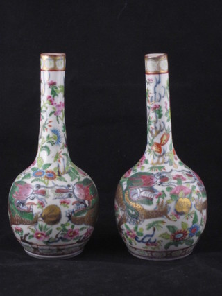 A pair of Canton famille rose porcelain club shaped vases 7"