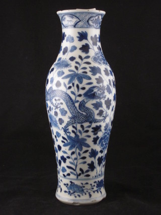 An Oriental blue and white porcelain club shaped vase, the base with 4 character mark and chip to base, 12"
