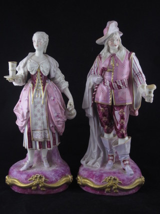 A pair of 19th Century Continental porcelain figures of standing lady and gentlemans with beakers, lady's beaker f, 13"   ILLUSTRATED