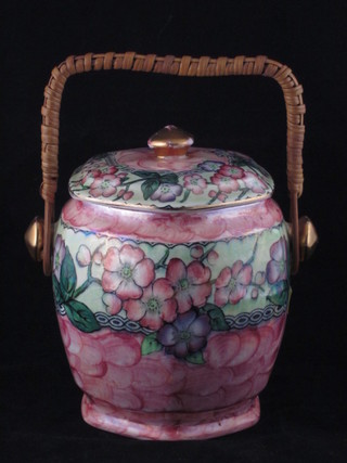A Malingware rectangular biscuit barrel with woven handle 6"