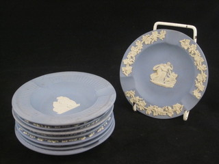 4 Wedgwood circular blue jasperware ashtrays and 4 dishes 5"