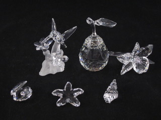 A Swarovski glass ornament in the form of a pear, do. humming bird, do. daffodil and 2 seagulls
