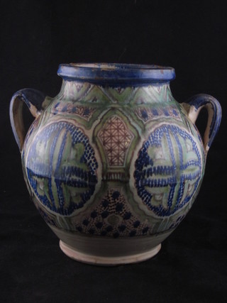 An Ismic style twin handled pottery vase 8"